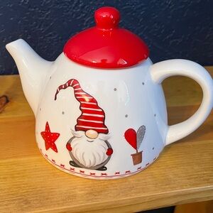 Festive Gnome Teapot star and heart accents.